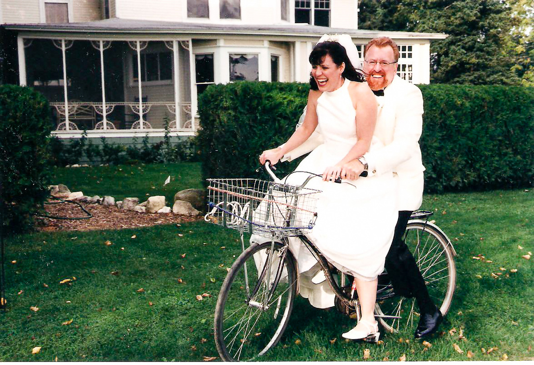 Bride and Groom ride a bicycle: 2 of 3