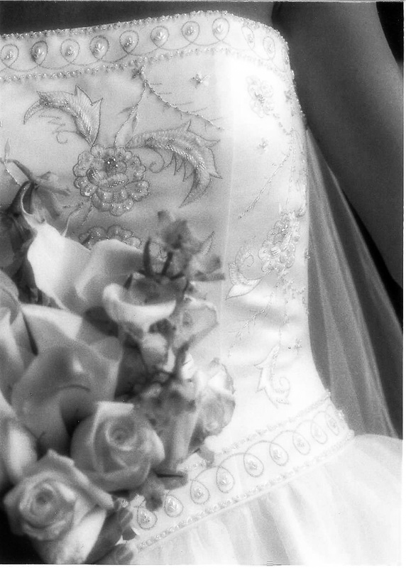 Close-up of beadwork on a wedding dress