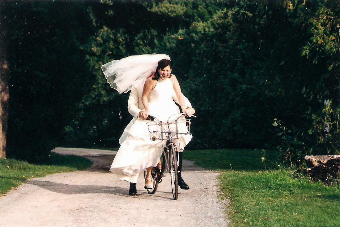 Bride and Groom Riding a bicycle:1 of 3